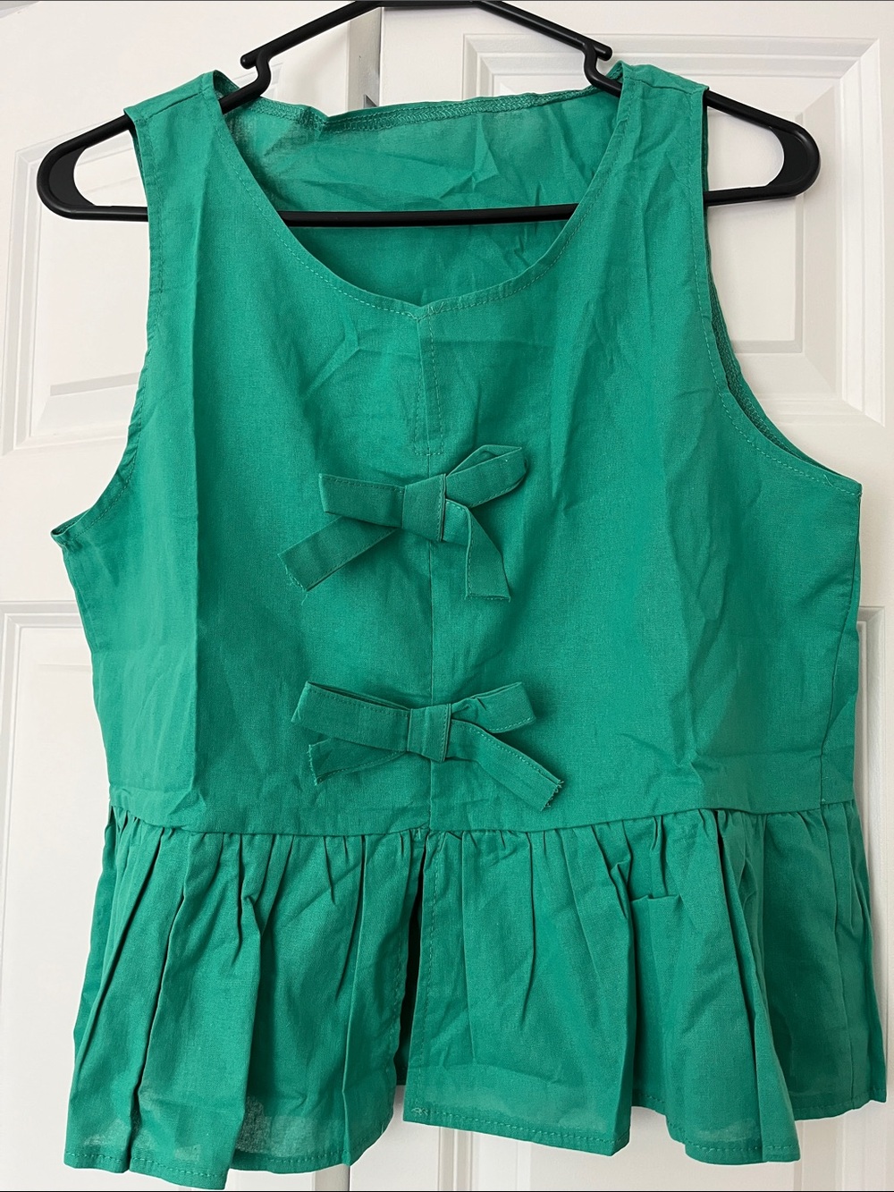 Green Sleeveless Bow Peplum Top